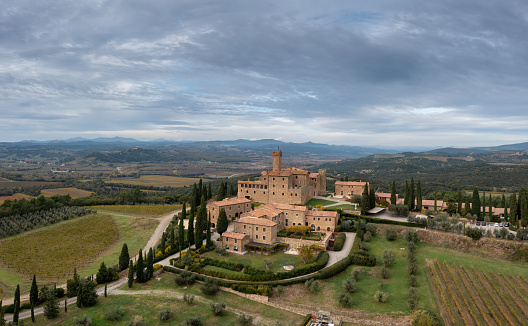 Montalcino, Italy - 16 November, 2023: aerial view of the Poggio alle Mura Castle and Villa Banfi wine resort in Tuscany