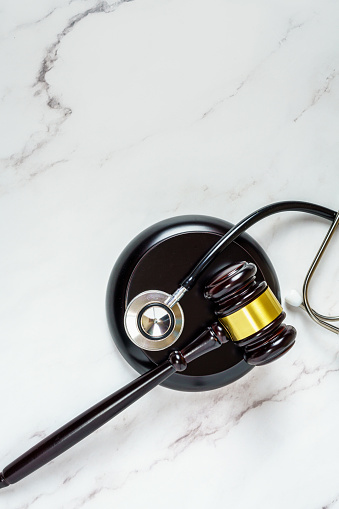 Judge Gavel and stethoscope. Medical law, medical malpractice ruling.