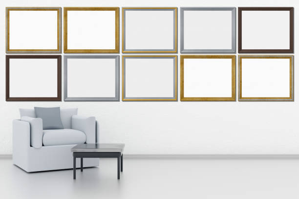Frames, empty paintings on display on white wall. Ten frames with empty space for inserting text or images. Wooden, silver and gold frames.