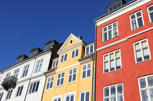 Low angle view of old historic multi story buildings facades.