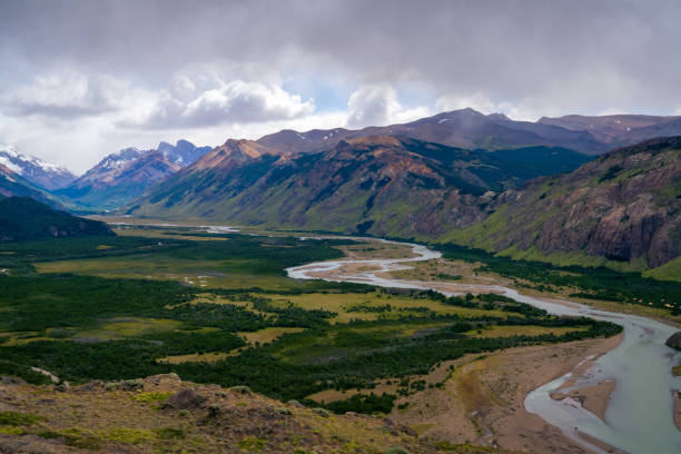istock Mountains viewpoint in el chalten with river and dramatic cloud (Patagonia, Argentina) 1884380199