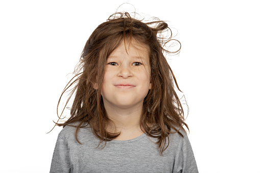 Christmas Morning Chaos: Young Girl with Bedhead on White Background