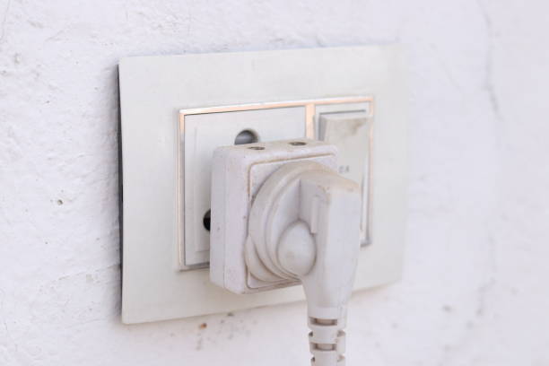 istock A white colored electric plug pin socket adapter or extender attached to a electric board with a white three pin plug 1884442167