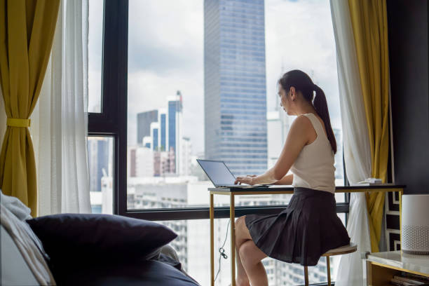 istock businesswoman working at home 1884463080