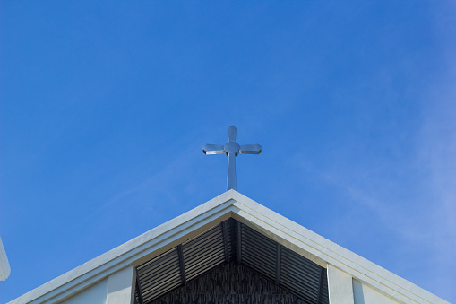 The cross as a symbol of the Catholic church is on the roof of the church, the cross on the roof of the Catholic church