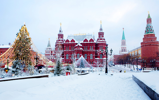 Moscow - Russia, November 23rd, 2020 - The first snow of the year arrived in Moscow and the Red Square is completely covered. Kremlin under the snow.