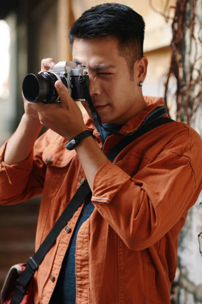 istock Photographer Taking Photos 1884496246