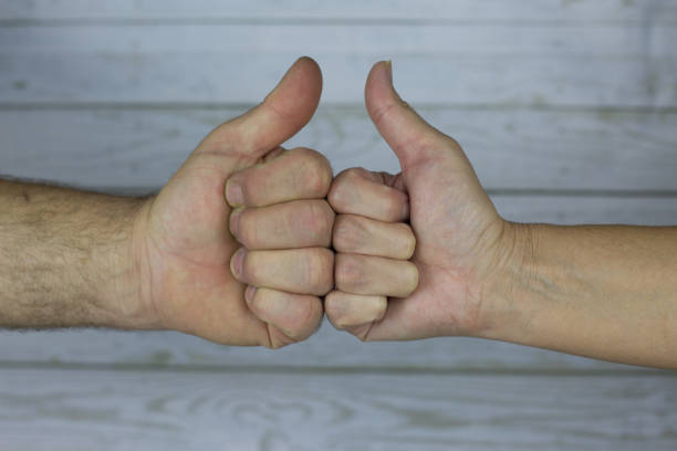 istock Thumbs up senior hands close up 1884508181