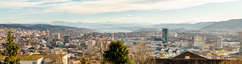 Zurich scenic view with beautiful lake, mountains and Primetower. Autumn sunshine