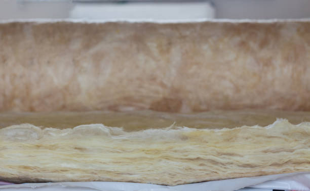 istock Insulating the house with mineral wool. Insulation 1884670447