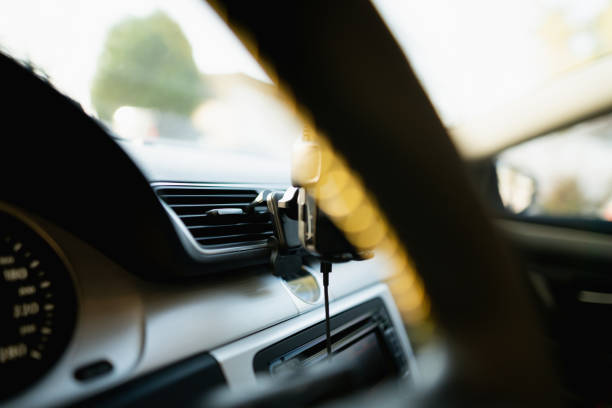 istock Wireless Car Charger And Smart Phone 1884685431