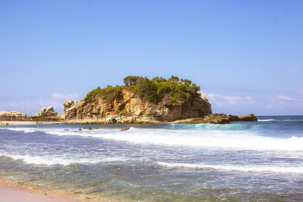 istock Beautiful beach with waves breaking on the rocks, Pacitan Klayer, East Java, Indonesia 1884689146