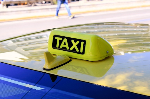 Taxi cab sign in Athens, Greece