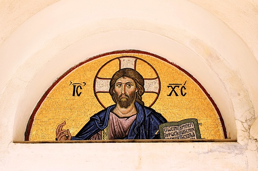 Beautiful mosaic of Jesus Christ outside of a Christian orthodox church in Athens, Greece, April 10 2020.