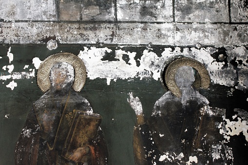 Destroyed frescoes inside old byzantine church in Athens, Greece, June 17 2020.
