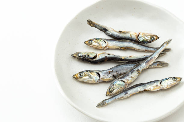 istock Dried sardines on a white background. 1884766188
