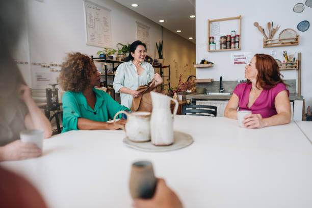 istock Mature woman arriving on a workshop 1884781467