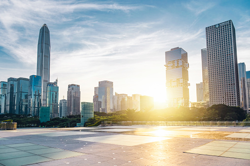 Panoramic skyline and buildings with empty square floor