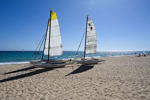 Jandia , Spain, November 16, 2023 - Catamarans at Esquinzo Playa / Morro Jable, Fuerteventura, Canary Islands, Spain.