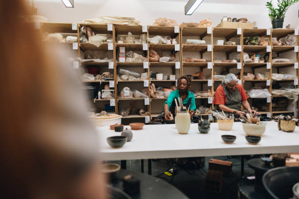 istock Friend potters on pottery class at a ceramics workshop 1884835502
