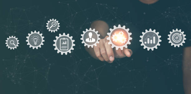 istock technology business, manager touching gears icons. operations system management involving business process and workflow, problem solving, monitoring and evaluation, quality control. high performance, 1884854330