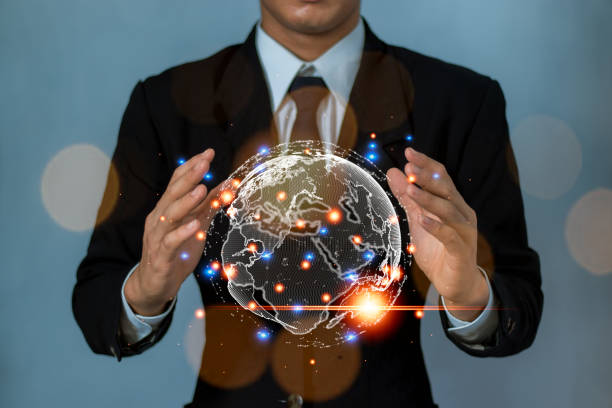 istock Businessman holding Global network connection. World map point and line composition concept of global business. Big data analytics and business intelligence concept.  Digital link tech. 1884858923