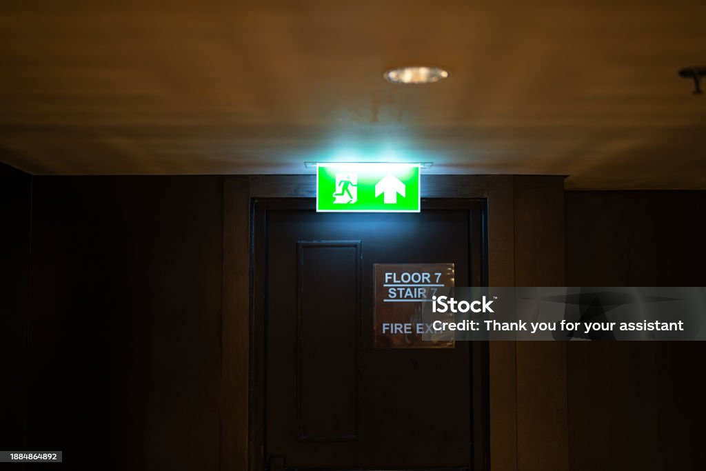 Ceiling Escape Emergency Fire Exit Escape Sign Stock Photo - Download Image Now ...