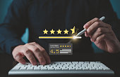 Customer drags scroll bar to choose 4 or 5 star service or product rating evaluation experience. Satisfaction survey concept. Client reviews quality of services leading to business reputation score.