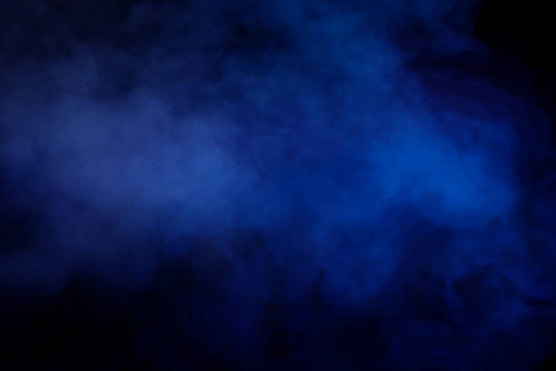 istock Blue and purple steam on a black background. 1884898567