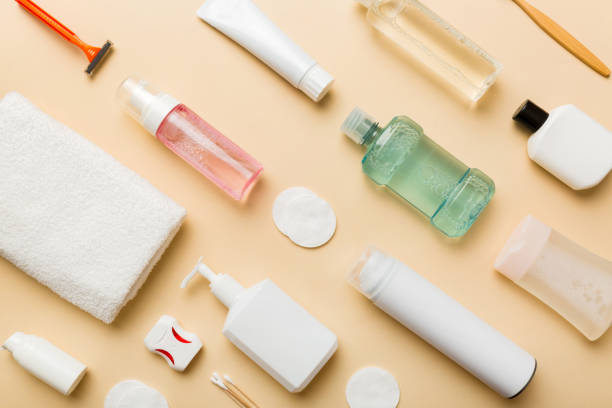 istock Mockup for bathing products top view flat lay, spa razor, toothpaste, soap, gel and other various accessories. Cosmetics for skin health. Bath Mockup for your logo 1884907134