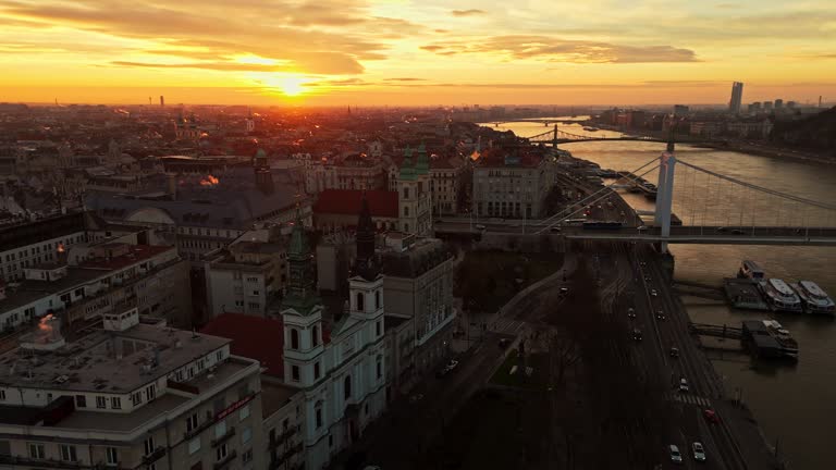 AERIAL Drone Footage of Elisabeth Bridge over Danube River by Cityscape During Sunset in Budapest,Hungary