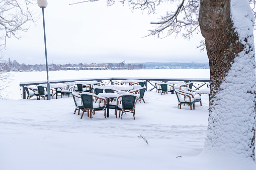 An open-air cafe on the shore of Lake Vesijärvi in the winter season. Lahti Finland