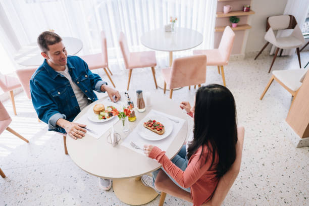 istock Couple eating at restaurant 1885003843