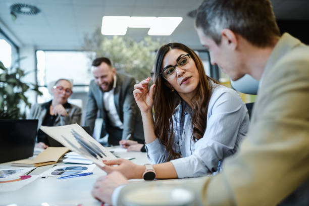 istock Project Manager And Financial Manager Teaming Up In Company 1885019675