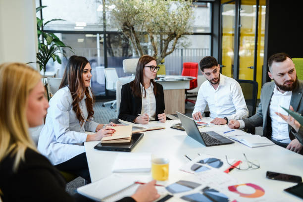 istock Discussions By Business People During Meeting 1885020702