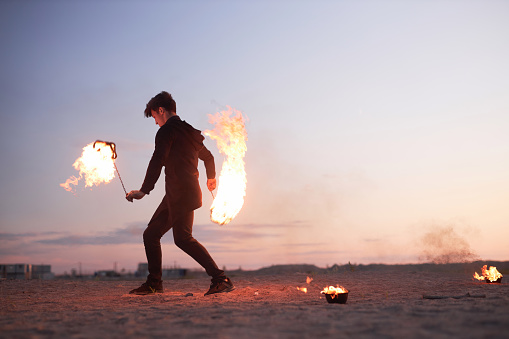 Outdoor display of skill with fire.