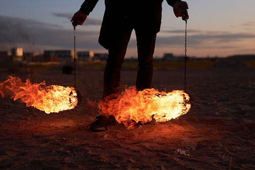 Outdoor display of skill with fire.