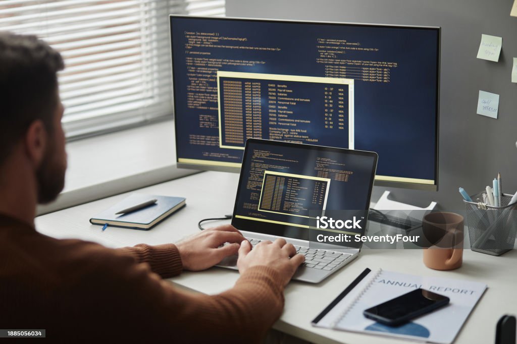 Pager Computer Programmer Programmer Using Computer In Office And Writing Code Stock Photo ...