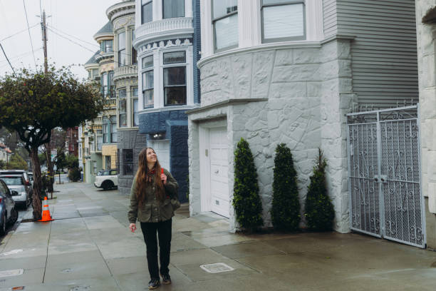 istock Happy Woman with Backpack Exploring San Francisco City in California 1885056607