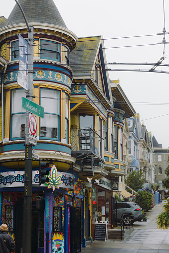March 19, 2023: walking the famous Haight-Ashbury district of San Francisco, California with colourful stores, restaurants and boutiques during rainy day