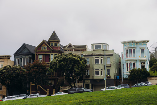 View of the street with beautiful colorful houses in the central district of San Francisco city, the United States