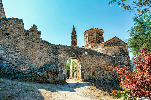 Kardamili old town, Messenia, Greece. Old Kardamili is a small collection of abandoned fortified tower-houses clustered around a beautiful 18th century church in Messenia Peloponnese Greece.