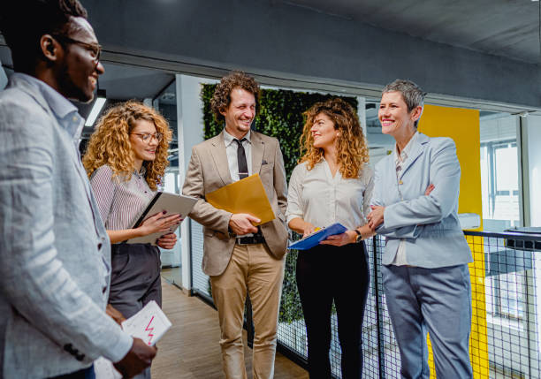 istock Business people discussing in the lobby 1885088151