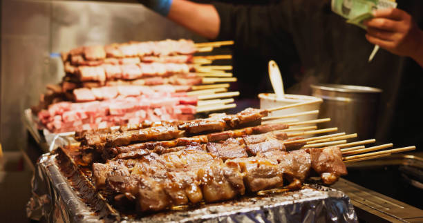 istock buying korean skewers 1885102098