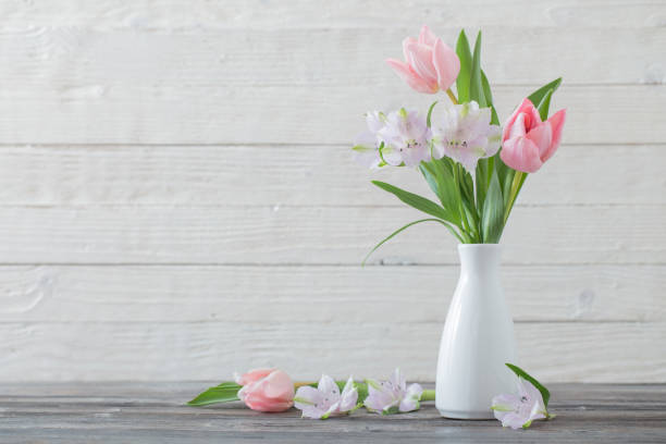 istock spring flowers in white vase 1885116969