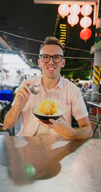 istock man visit the night market 1885118551