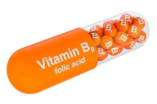 Vitamin capsule with B9, folic acid. 3D rendering isolated on white background