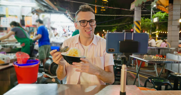 istock man visit the night market 1885118571