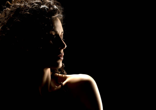istock Sensual Profile Silhouette Portrait on Dark Background 1885136205