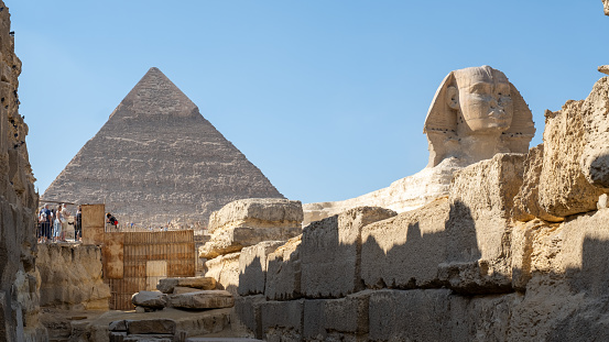 Caire, Egypt - 16.11.2023 - Khafre pyramid and sphinx are very close to each other. Historical monuments in the protected area attract great attention from tourists. During the autumn, this tourist area doesn't lose interest.